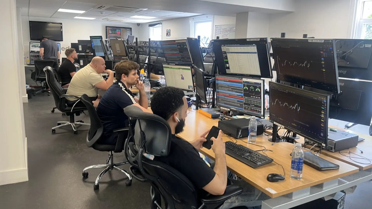 Traders working on our live trading floor